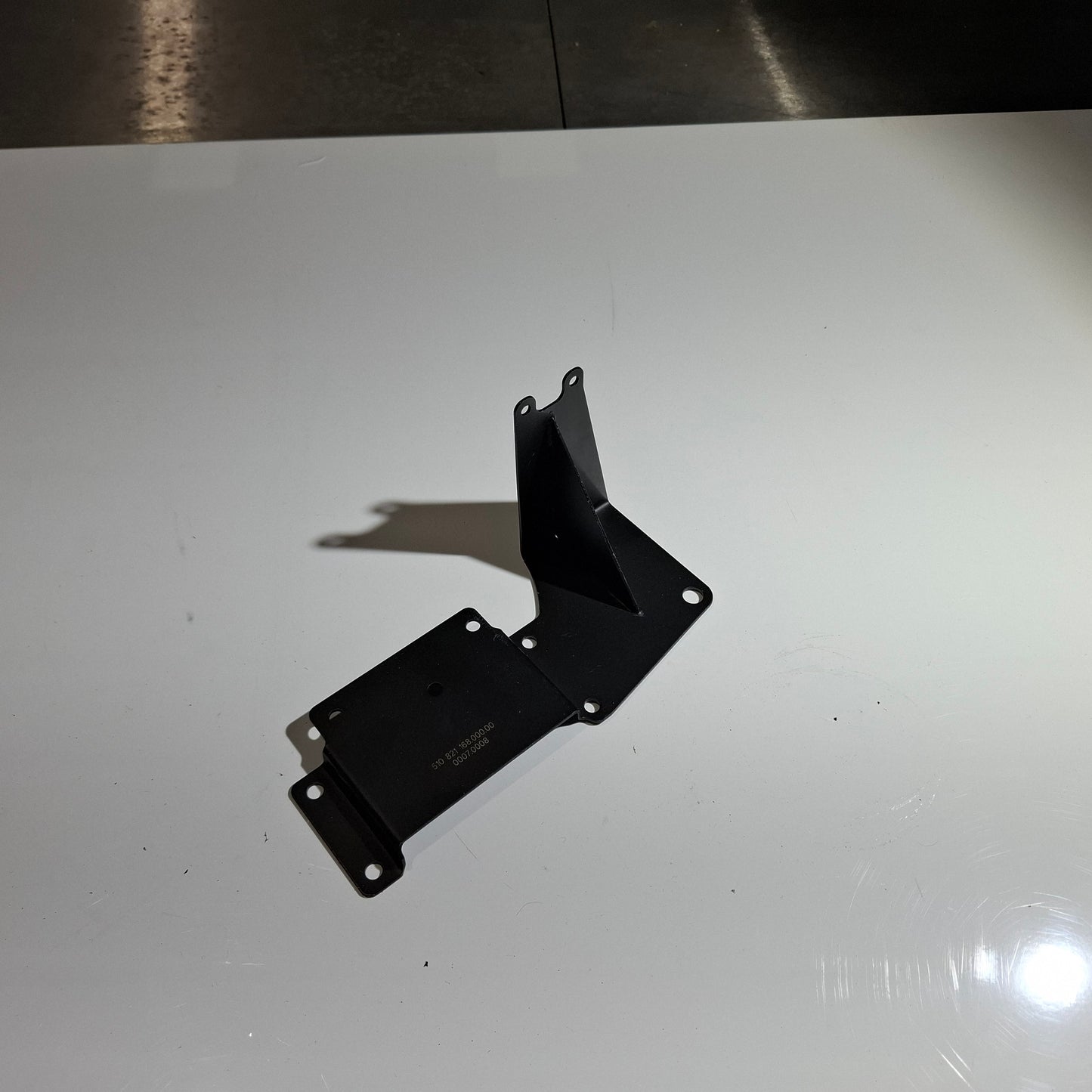HYDRAULIC ASSEMBLY BRACKET (EVOLUTION 2013)
