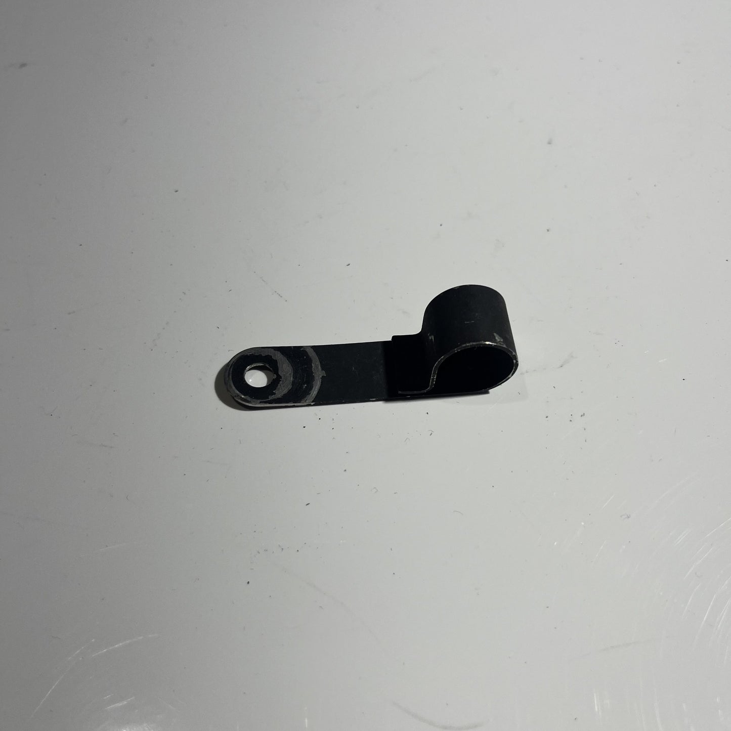 BRACKET, VACUUM PUMP HOSE